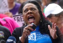 NEA president becky pringle speaking at protest event