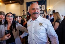 Riverside County Sheriff Chad Bianco speaking to attendees after announcing his bid for governor.