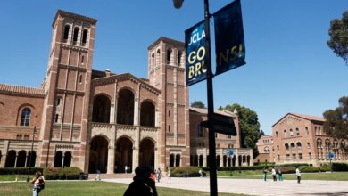 People walking on the plaza outside Royce Hall on the UCLA campus.