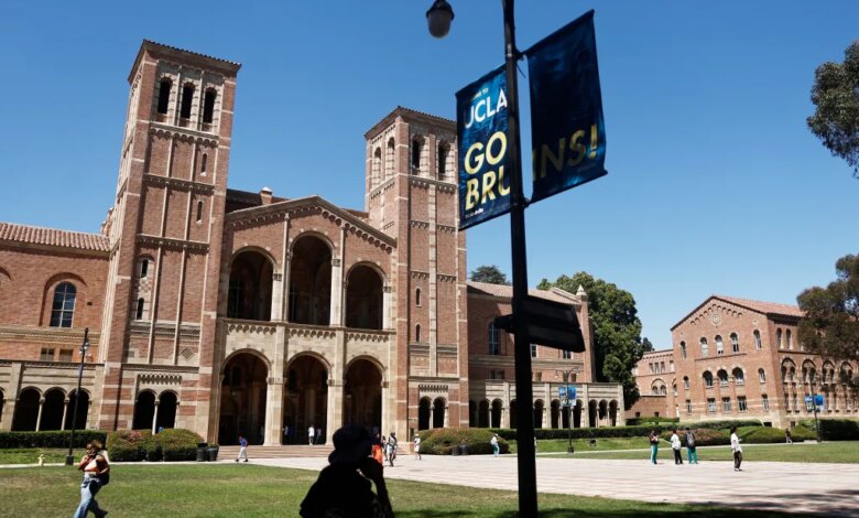 People walking on the plaza outside Royce Hall on the UCLA campus.