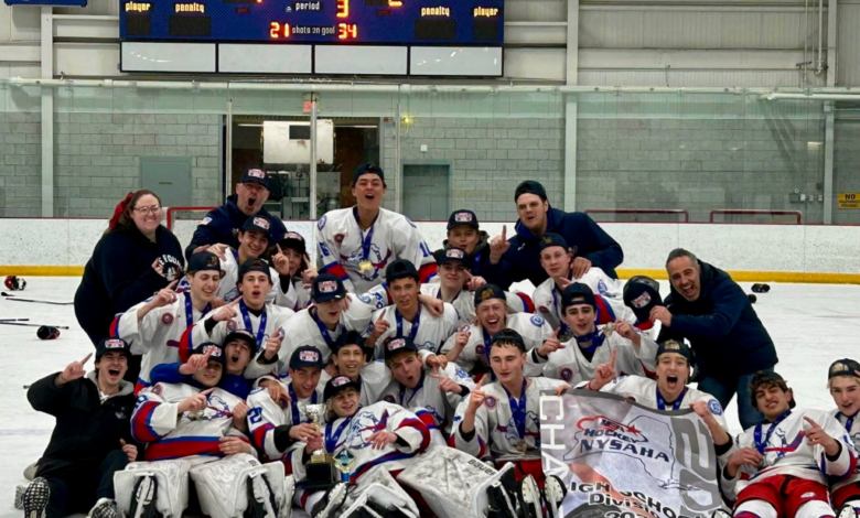 Bellmore-Merrick celebrates after winning the state championship in high school boys hockey.
