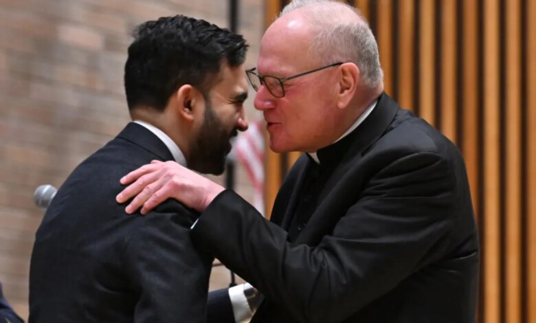 Cardinal Timothy Dolan whispers into Mamdani's ear at NYPD event — as ex-archbishop said he was 'ticked off' at mayoral snubs