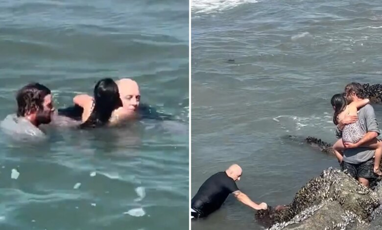 Dramatic video shows brave surf instructor jump into to action to save drowning girl