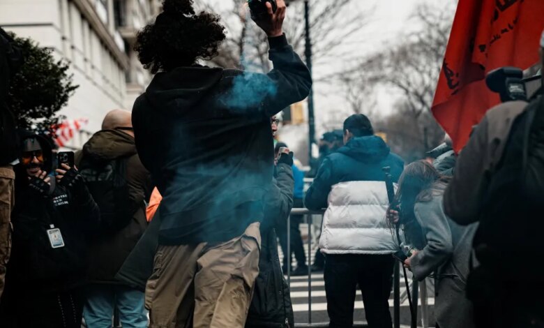 A suspect throws a handmade explosive at supporters of U.S. President Donald Trump during a rally to stop public Muslim prayer, in New York City, U.S., March 7, 2026.
