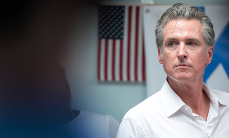 California Gov. Gavin Newsom listens to a question during an event in South Carolina.