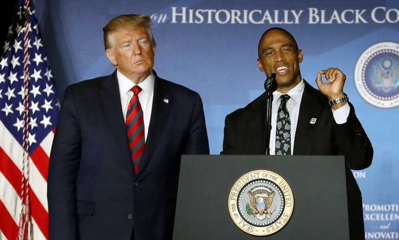 President Donald Trump standing next to HUD Secretary Scott Turner.