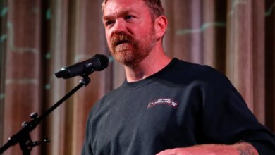 Graham Platner speaking at a town hall.