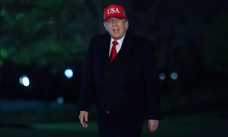 President Donald Trump talks to reporters as he walks on the South Lawn upon his arrival to the White House, Sunday, April 12, 2026, in Washington. (AP Photo/Jose Luis Magana)