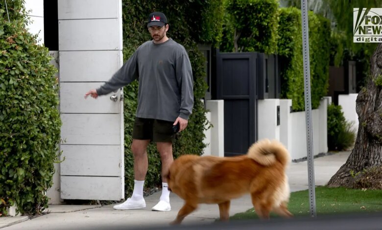 Hasan Piker standing outside his West Hollywood home