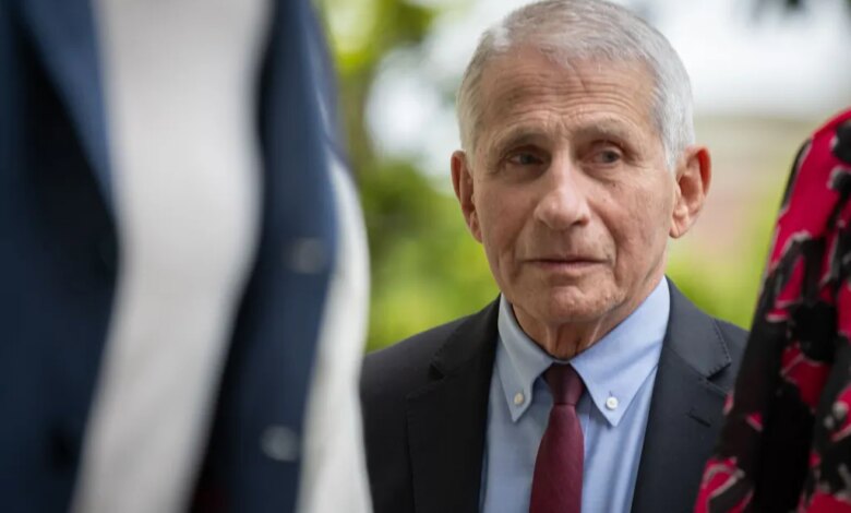 Dr. Anthony Fauci in a suit and tie looks to his right at the 33rd Annual White House Correspondents' Garden Brunch.