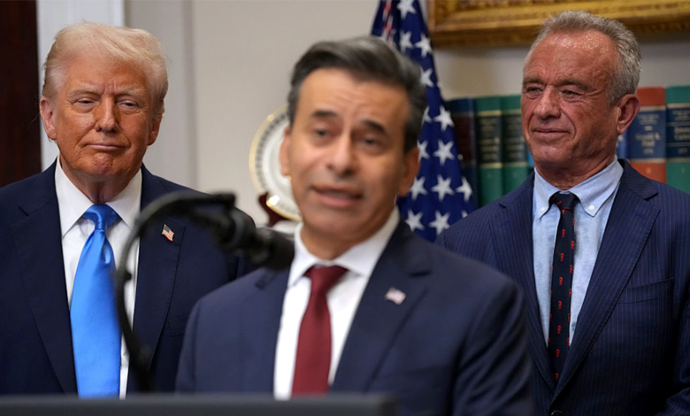 President Donald Trump and Health and Human Services Secretary Robert F. Kennedy Jr. looking on as FDA Commissioner Dr. Marty Makary speaks in the White House Roosevelt Room