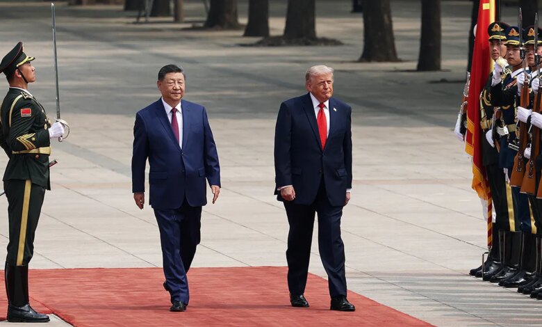 U.S. President Donald Trump and Chinese President Xi Jinping reviewing honor guard at Great Hall of the People