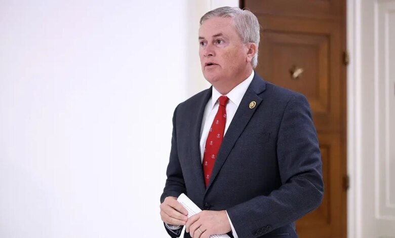 Rep. James Comer walking in a hallway before a closed-door interview