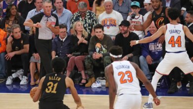 Actors Ben Stiller, Christine Taylor, Michael J. Fox, and Timothée Chalamet sit courtside at an NBA Eastern Conference Finals game.