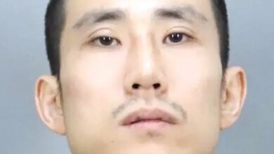 Mugshot of Myung Jin Kim, a California fugitive wanted in connection with two murders.