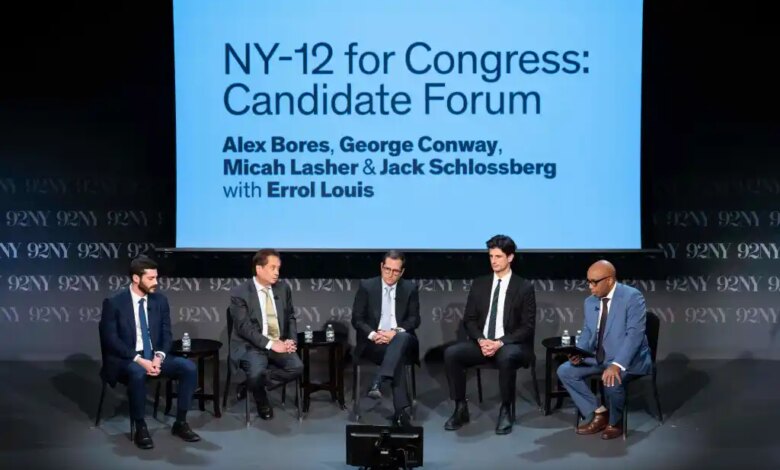 Five men sitting on stage during the "NY-12 for Congress: Candidate Forum."