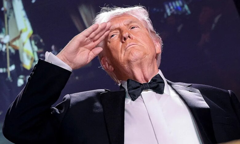 U.S. President Donald Trump saluting at the White House Correspondents' Association dinner