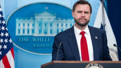 JD Vance speaking at a press briefing in the White House.