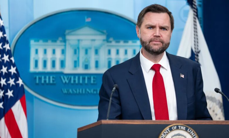 JD Vance speaking at a press briefing in the White House.