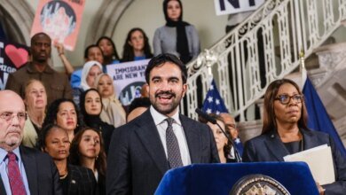 New York City Mayor Zohran Mamdani speaking at a press conference next to Attorney General Letitia James.